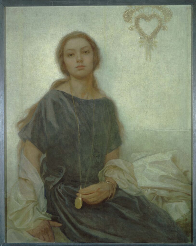 Obraz olejny przedstawia portret pięknej młodej kobiety, córki artysty Jaroslavy., Dziewczyna, namalowana w centrum przedstawienia, ubrana jest w ciemną suknięktóra siedzi centralnie w ciemnej sukni. Jej przedramiona oplata szal z jasnego i lekko przejrzystegoym materiału. W lewej dłoni trzyma  eliptyczny medalion zawieszony na długim złotym łańcuszku, na ręce ma dwie złote bransoletki. Drugą ręką podpiera się na siedzeniu. Jej spokojne spojrzenie skierowanea jest w  stronę widza. Za nią leży biały udrapowany materiał rozmywający się z jasnym tłem ściany. W, na której po prawej górnej stronie obrazu namalowanoe jest dekoracyjne blado beżowe serce.